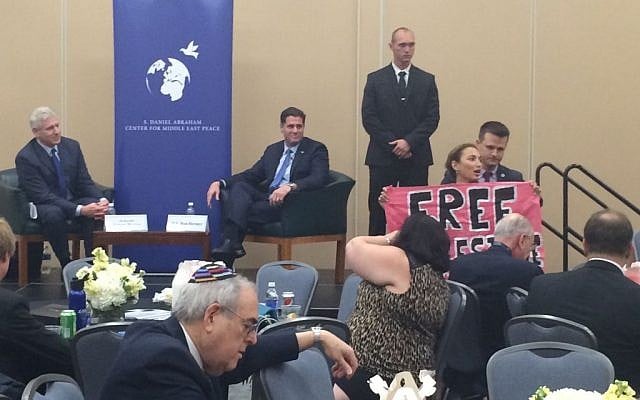 CodePink activist Ariel Gold interrupts Israeli Ambassador to the US Ron Dermer at an event during the 2016 Democratic National Convention (Eric Cortellessa/Times of Israel)