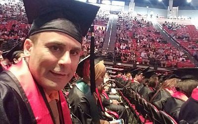 Robin Shahini during his May 2016 International Security and Conflict Resolution San Diego State University graduation ceremony (Shahini Family Photo via AP) Robin Shahini during his May 2016 International Security and Conflict Resolution San Diego State University graduation ceremony (Shahini Family Photo via AP)