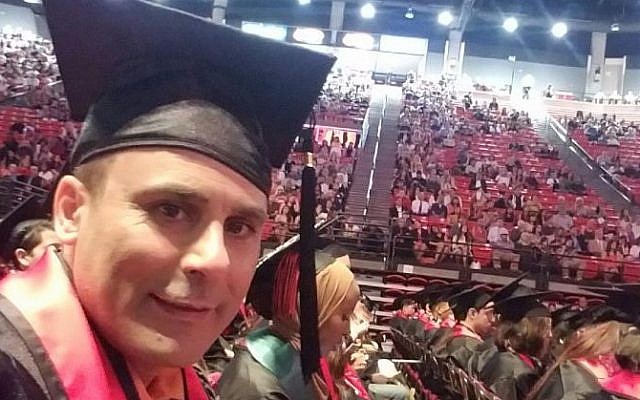 Robin Shahini during his May 2016 International Security and Conflict Resolution San Diego State University graduation ceremony (Shahini Family Photo via AP) Robin Shahini during his May 2016 International Security and Conflict Resolution San Diego State University graduation ceremony (Shahini Family Photo via AP)