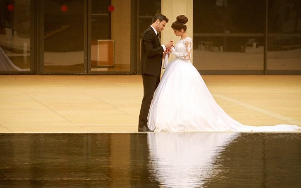 An illustrative photo of a bride and groom taking portraits prior to their wedding, in Tel Aviv, November 4, 2015. (Flash90) An illustrative photo of a bride and groom taking portraits prior to their wedding, in Tel Aviv, November 4, 2015. (Flash90)