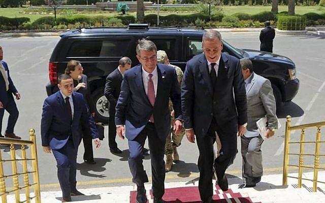 Visiting US Defense Secretary Ash Carter, center left, accompanied by the Iraqi Defense Minister Khaled al-Obeidi, center right, arrives to the Ministry of Defense in Baghdad, Iraq, Monday, July 11, 2016 (AP Photo) Visiting US Defense Secretary Ash Carter, center left, accompanied by the Iraqi Defense Minister Khaled al-Obeidi, center right, arrives to the Ministry of Defense in Baghdad, Iraq, Monday, July 11, 2016 (AP Photo)