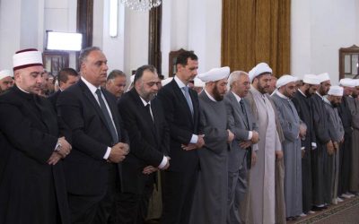 Syrian President Bashar Assad prays on the first day of Eid al-Fitr, that marks the end of the Muslim holy month of Ramadan, at the Safa Mosque, in Homs, Syria, July 6, 2016. (Syrian Presidency via Facebook)