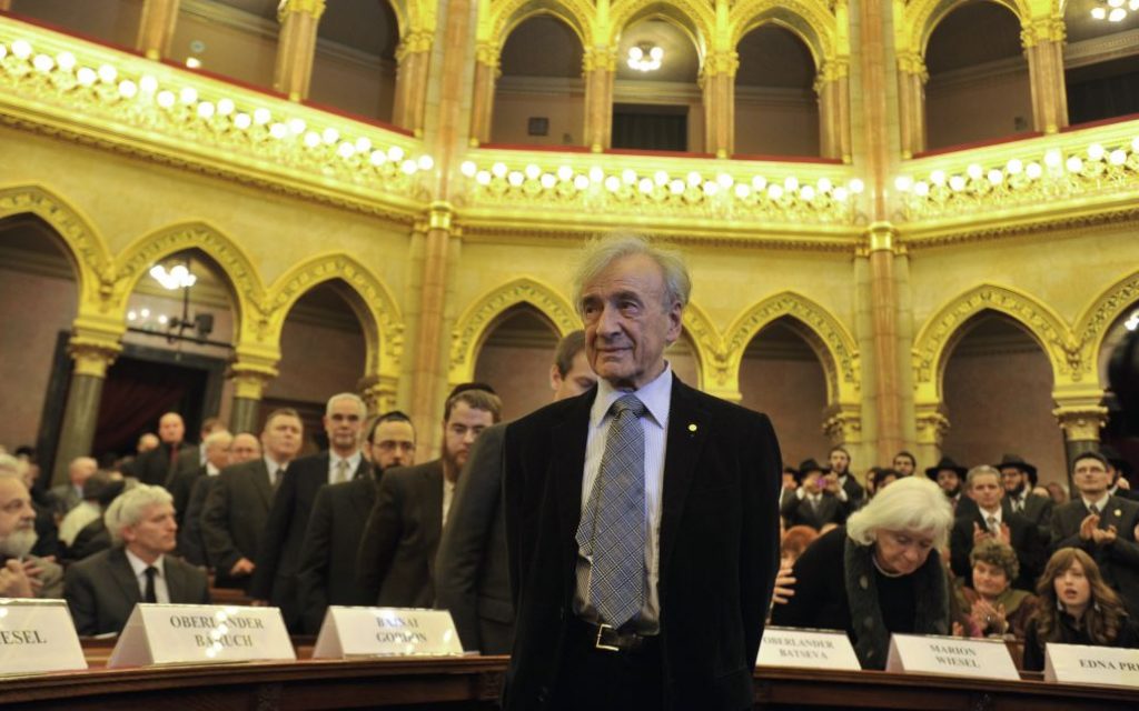 Elie Wiesel arrives in the Hungarian Parliament building in Budapest in 2009. (AP Photo/Bela Szandelszky, file)