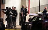 Dallas police respond after shots were fired during a protest over recent fatal shootings by police in Louisiana and Minnesota, Thursday, July 7, 2016, in Dallas. Snipers opened fire on police officers during protests; several officers were killed, police said. (Maria R. Olivas/The Dallas Morning News via AP)