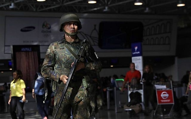 A police officer patrols inside Rio de Janeiro International Airport in Rio de Janeiro, Brazil, Wednesday, July 27, 2016. (AP Photo/Patrick Semansky) A police officer patrols inside Rio de Janeiro International Airport in Rio de Janeiro, Brazil, Wednesday, July 27, 2016. (AP Photo/Patrick Semansky)