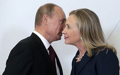 Russian President Vladimir Putin meets then-US secretary of state Hillary Clinton on her arrival at the APEC summit in Vladivostok, Russia, Sept. 8, 2012. (AP Photo/Mikhail Metzel, pool, file) Russian President Vladimir Putin meets then-US secretary of state Hillary Clinton on her arrival at the APEC summit in Vladivostok, Russia, Sept. 8, 2012. (AP Photo/Mikhail Metzel, pool, file)