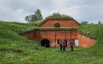 A film crew preparing to record at the former concentration camp known as the Seventh Fort in Kaunas, Lithuania, July 12, 2016. (Cnaan Liphshiz)