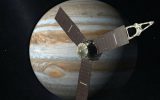 This artist's rendering provided by NASA and JPL-Caltech shows the Juno spacecraft above the planet Jupiter. (NASA/JPL-Caltech via AP)
