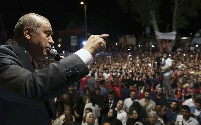 Turkey's President Recep Tayyip Erdogan addresses his supporters gathered in front of his residence in Istanbul, early Tuesday, July 19, 2016. (Kayhan Ozer/pool photo via AP) Turkey's President Recep Tayyip Erdogan addresses his supporters gathered in front of his residence in Istanbul, early Tuesday, July 19, 2016. (Kayhan Ozer/pool photo via AP)