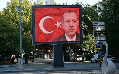 A portrait of Turkey's President Recep Tayyip Erdogan appears on a billboard in Tunali Hilmi Street in Ankara, Turkey, Saturday, July 16, 2016. (AP Photo/Burhan Ozbilici)