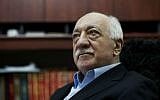 In this March 15, 2014 file photo, Turkish Muslim cleric Fethullah Gulen sits in his residence in Saylorsburg, Pennsylvania. (AP Photo/Selahattin Sevi, File)