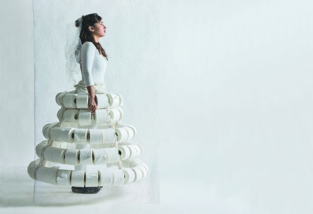 In 'Wedding Doll' main character Hagit works in a toilet paper factory, weaving her dreams into white paper dresses. (Gabriel Baharlia) In 'Wedding Doll' main character Hagit works in a toilet paper factory, weaving her dreams into white paper dresses. (Gabriel Baharlia)