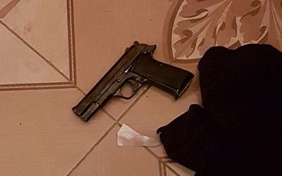 A pistol found during a raid by Israeli security forces in Urif, outside of Nablus, as part of a crackdown on illegal weapons in the West Bank on July 10, 2016. (Shin Bet) A pistol found during a raid by Israeli security forces in Urif, outside of Nablus, as part of a crackdown on illegal weapons in the West Bank on July 10, 2016. (Shin Bet)
