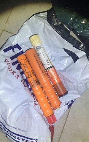 Stun grenades seized by police as part of a mass crackdown on violence in sports in which 56 fans linked to the Beitar Jerusalem soccer team were arrested, July 26, 2016. (Israel Police)