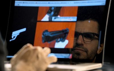 Yuval Orr surfs the dark net in a scene from "Down the deep, dark web" (Courtesy)