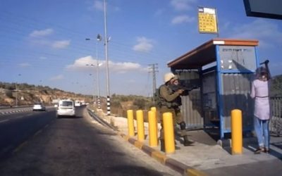 A Palestinian woman attempts to stab 2 Israeli soldiers near the West Bank city of Ariel on July 5, 2016. (Screen capture: YouTube)