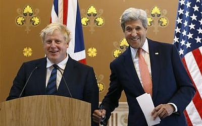 Britain's Foreign Secretary Boris Johnson, left, and US Secretary of State John Kerry joke together during a press conference at the Foreign Office in London, Tuesday, July 19, 2016. (AP Photo/Kirsty Wigglesworth, pool) 