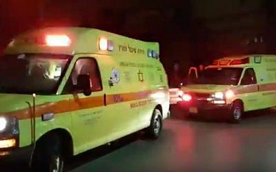 Magen David Adom ambulances evacuating wounded people to Soroka Hospital in Beersheba after a brawl in the Bedouin community of Kuseife, July 31, 2016. (YouTube/Times of Israel)