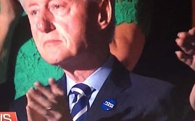 Bill Clinton sporting a Hebrew Hillary Clinton button on Wednesday July 27 2016 at the Democratic National Convention in Philadelphia. (MSNBC via JTA)