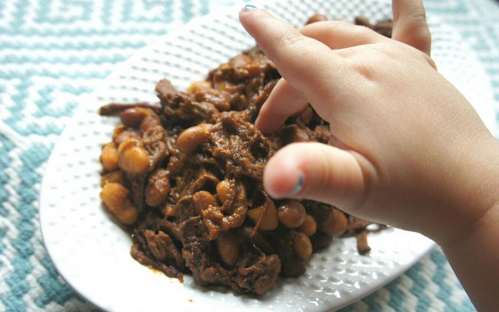 The brisket was such a hit, writer Shannon Sarna's 4-year-old stuck her finger right into the dish. (Shannon Sarna/via JTA) The brisket was such a hit, writer Shannon Sarna's 4-year-old stuck her finger right into the dish. (Shannon Sarna/via JTA)