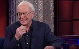 British actor Michael Caine talks to Stephen Colbert on The Late Show in November 2015 (screen capture: YouTube)