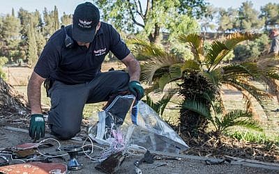Security forces examine debris from Patriot Missiles fired at an unidentified drone that entered Israeli airspace from Syria, July 17, 2016. (Basel Awidat/Flash90)