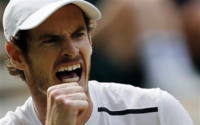 Andy Murray of Britain celebrates a point against Milos Raonic of Canada during the men's singles final on the fourteenth day of the Wimbledon Tennis Championships in London, Sunday, July 10, 2016. (AP Photo/Ben Curtis) 