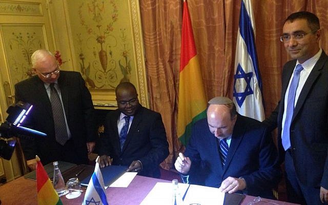Foreign Ministry director-general Dore Gold (second from right) signs a deal to restore diplomatic ties with Guinea in Paris, France on July 20, 2016. (Courtesy Israel Ministry of Foreign Affairs) Foreign Ministry director-general Dore Gold (second from right) signs a deal to restore diplomatic ties with Guinea in Paris, France on July 20, 2016. (Courtesy Israel Ministry of Foreign Affairs)