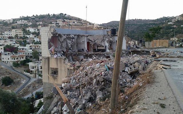 The remains of a house in the West Bank village of Surif, after it was hit by an IDF missile during an arrest raid of a Hamas cell early July 27, 2016 (IDF Spokesman's Unit)