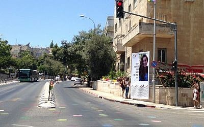 People leave flowers at a flowers at a memorial to Shira Banki, 16, who was murdered in a stabbing attack a year early during the Jerusalem Gay Pride Parade, seen ahead of the 2016 event held on July 21, 2016. (Times of Israel/Stuart Winer) People leave flowers at a flowers at a memorial to Shira Banki, 16, who was murdered in a stabbing attack a year early during the Jerusalem Gay Pride Parade, seen ahead of the 2016 event held on July 21, 2016. (Times of Israel/Stuart Winer)