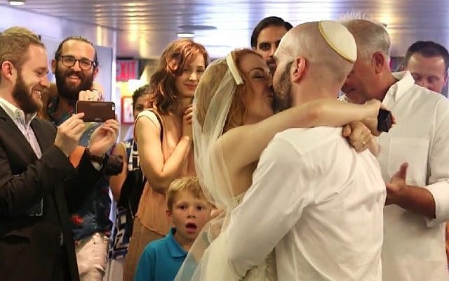 Bethany Hall, Keith Haskel got married aboard the Staten Island ferry on July 8, 2016. (Screenshot/YouTube) Bethany Hall, Keith Haskel got married aboard the Staten Island ferry on July 8, 2016. (Screenshot/YouTube)