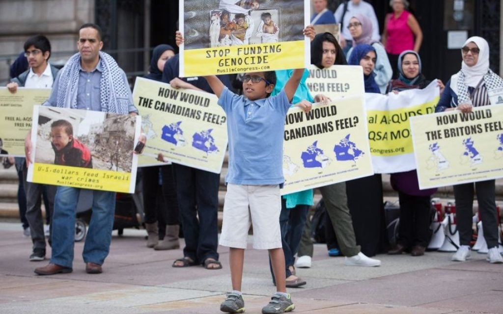 The Boston 'Al-Quds Day' demonstration on July 1, 2016, outside the Boston Public Library in Boston, Massachusetts (Elan Kawesch/The Times of Israel) The Boston 'Al-Quds Day' demonstration on July 1, 2016, outside the Boston Public Library in Boston, Massachusetts (Elan Kawesch/The Times of Israel)