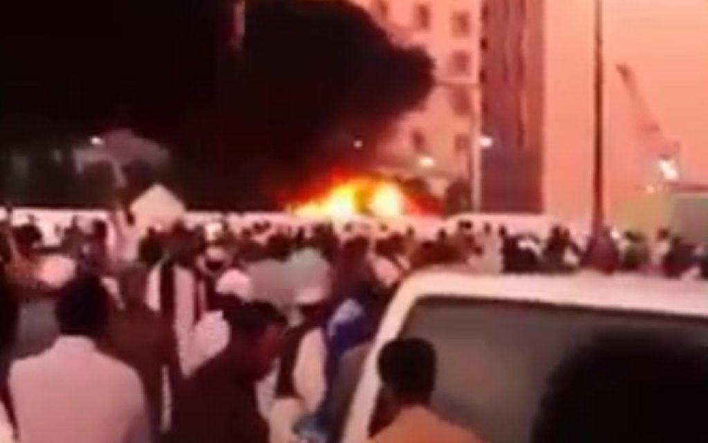 A fire rages at the scene of a suicide bombing in the Muslim holy city of Medina in Saudi Arabia on Monday, July 4, 2016 (screen capture: YouTube)