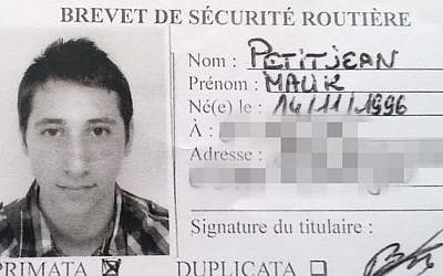 The driving license of 19-year-old Abdel-Malik Nabil Petitjean, who was shot dead by police after killing an elderly priest in an attack at a church in Normandy, France on July 26, 2016 (AFP)