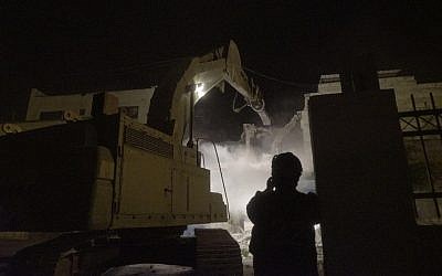 Security forces destroying the home of Palestinian Balal Abu Zeid who was convicted of assisting in a terror attacked during which a border guard was killed. Abu Zeid's home in Qabatiya was demolished July 18, 2016. (IDF spokesperson)