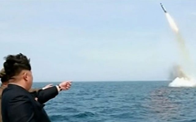 North Korean leader Kim Jong-un looks on as a submarine-launched missile emerges from the water in 2015 (YouTube screenshot) North Korean leader Kim Jong-un looks on as a submarine-launched missile emerges from the water in 2015 (YouTube screenshot)
