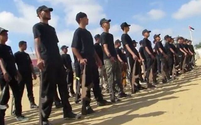 Gaza youth training at a Hamas summer camp (Middle East Media Research Institute) Gaza youth training at a Hamas summer camp (Middle East Media Research Institute)