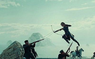 Screen shot of Gal Gadot, airborne, in a fight scene in a trailer for Warner Brothers' 'Wonder Woman.' (YouTube screen capture)