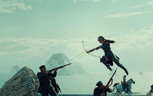 Screen shot of Gal Gadot, airborne, in a fight scene in a trailer for Warner Brothers' "Wonder Woman." (YouTube screen capture)