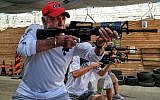 Actor James Caan at target practice in Gush Etzion during a 2016 visit to Israel (Courtesy Or Gefen)
