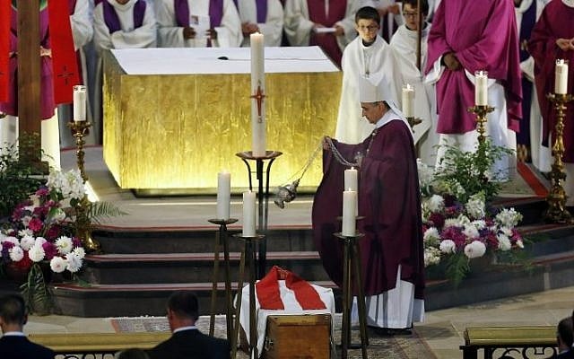 Archbishop of Rouen, Dominique Lebrun blesses Father Jacques Hamel's coffin at the Rouen cathedral in northern France on August 2, 2016. (AFP PHOTO / POOL / CHARLY TRIBALLEAU) Archbishop of Rouen, Dominique Lebrun blesses Father Jacques Hamel's coffin at the Rouen cathedral in northern France on August 2, 2016. (AFP PHOTO / POOL / CHARLY TRIBALLEAU)