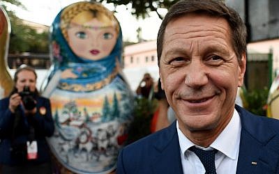 President of the Russian Olympic Committee Alexander Zhukov poses in front of a matryoshka doll at the opening ceremony of the 2016 Olympic Games in Rio de Janeiro, Brazil, on August 4, 2016. (AFP/Kirill Kudryavtsev)