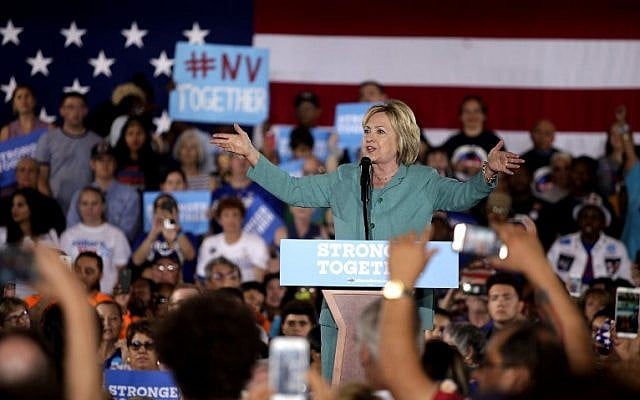 Democratic presidential nominee Hillary Clinton speaks to supporters about her plans for the economy and job creation during a rally at the International Brotherhood of Electrical Workers (IBEW) in Las Vegas, Nevada on August 4, 2016. (AFP PHOTO/John GURZINSKI)