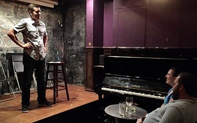 Muslim American comedian Dean Obeidallah, who was born in New Jersey to an Italian mother and a Palestinian father, performs at Jimmy's N° 43, a bar and club in the East Village, in New York on July 29, 2016. (Thomas Urbain/AFP)