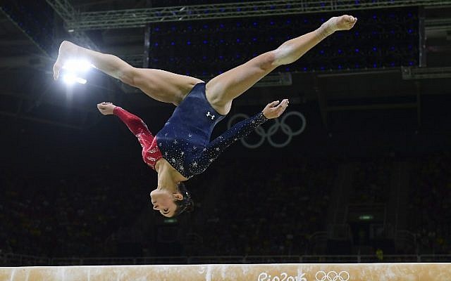 US gymnast Alexandra Raisman competes in the qualifying for the women's Beam event of the Artistic Gymnastics at the Olympic Arena during the Rio 2016 Olympic Games in Rio de Janeiro on August 7, 2016 (AFP PHOTO / Emmanuel DUNAND) US gymnast Alexandra Raisman competes in the qualifying for the women's Beam event of the Artistic Gymnastics at the Olympic Arena during the Rio 2016 Olympic Games in Rio de Janeiro on August 7, 2016 (AFP PHOTO / Emmanuel DUNAND)
