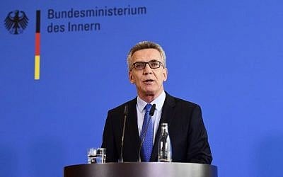 Germany's Interior Minister Thomas de Maiziere delivers a statement to announce new anti-terror measures in Berlin, on August 11, 2016. (AFP PHOTO / TOBIAS SCHWARZ)