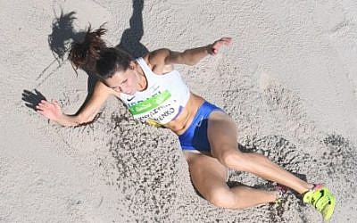 Israel's Hanna Knyazyeva competes in the Women's Triple Jump Qualifying Round during the athletics event at the Rio 2016 Olympic Games at the Olympic Stadium in Rio de Janeiro on August 13, 2016. (AFP PHOTO / Antonin THUILLIER)