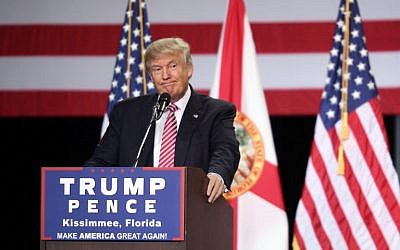 Republican presidential candidate Donald Trump addressing supporters during a campaign rally at Silver Spurs Arena inside the Osceola Heritage Park in Kissimmee, Florida.  August 10,  2016 (AFP PHOTO / Gregg Newton)