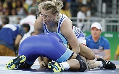 Israel's Ilana Kratysh (red) competes with Brazil's Gilda Maria de Oliveira (blue) in their women's wrestling 69kg freestyle qualification match at the Rio 2016 Olympic Games at the Carioca Arena 2 in Rio de Janeiro on August 17, 2016. (AFP PHOTO/Jack GUEZ) Israel's Ilana Kratysh (red) competes with Brazil's Gilda Maria de Oliveira (blue) in their women's wrestling 69kg freestyle qualification match at the Rio 2016 Olympic Games at the Carioca Arena 2 in Rio de Janeiro on August 17, 2016. (AFP PHOTO/Jack GUEZ)
