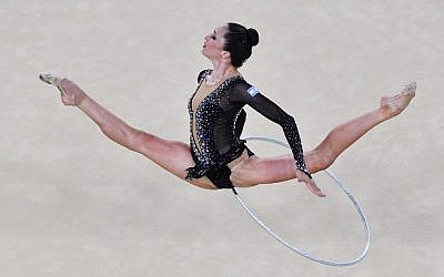 Israel's Neta Rivkin competes in the individual all-around qualifying event of the Rhythmic Gymnastics at the Olympic Arena during the Rio 2016 Olympic Games in Rio de Janeiro on August 19, 2016. (AFP PHOTO / Ben STANSALL)
